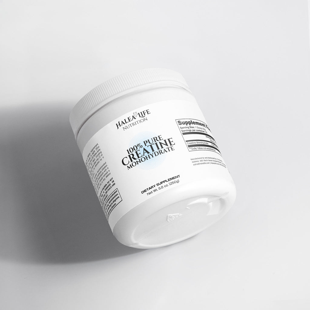 White container of Halea Life Nutrition 100% Pure Creatine Monohydrate on a light gray background