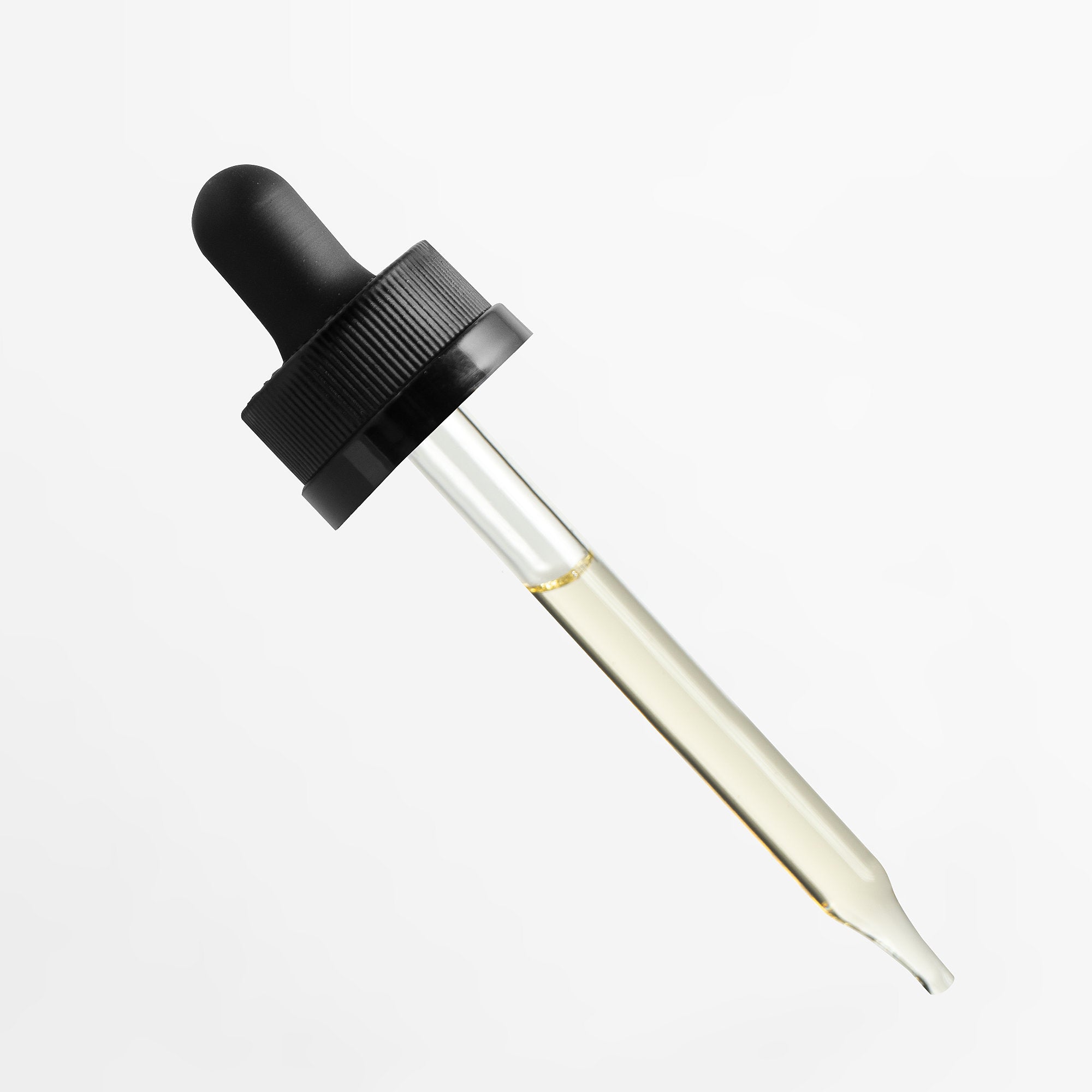 Dropper bottle with black cap and clear glass body on a white background