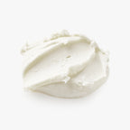White cream or yogurt swatch on a white background