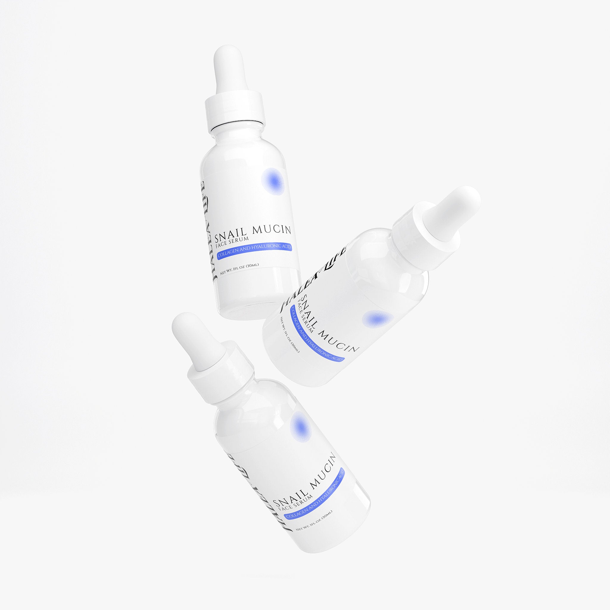 Three bottles of Snail Mucin serum on a white background