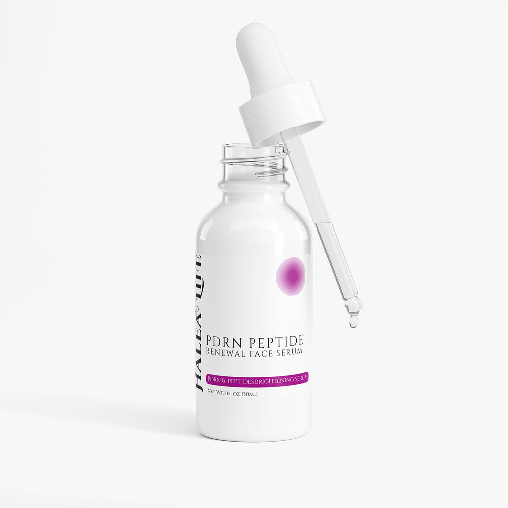 White serum bottle with dropper on a white background