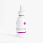 White bottle of PDRN Peptide Renewal Face Serum with dropper on a white background