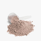 Halea Life Chocolate Pure Whey Protein Isolate texture detail view of cocoa powder and scoop size