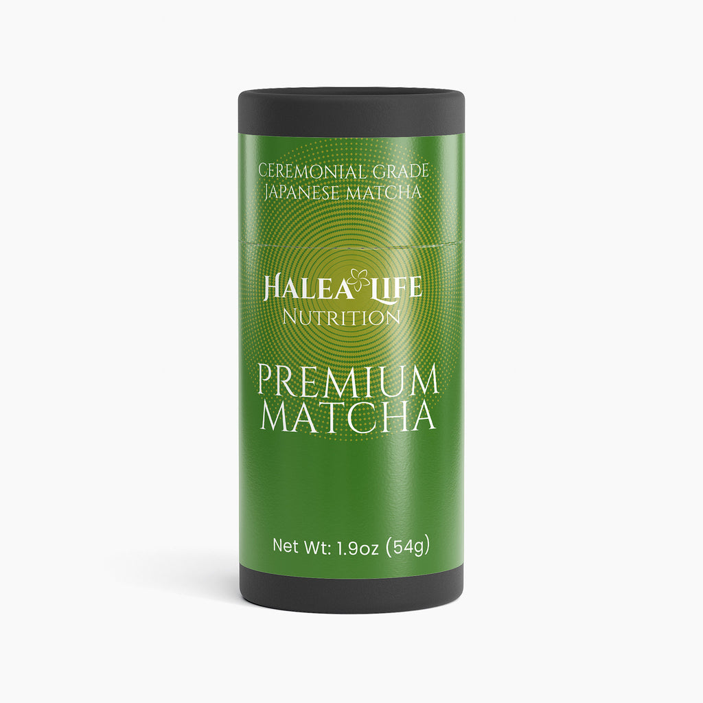 Green canister of Halea Life Nutrition Premium Matcha on a white background
