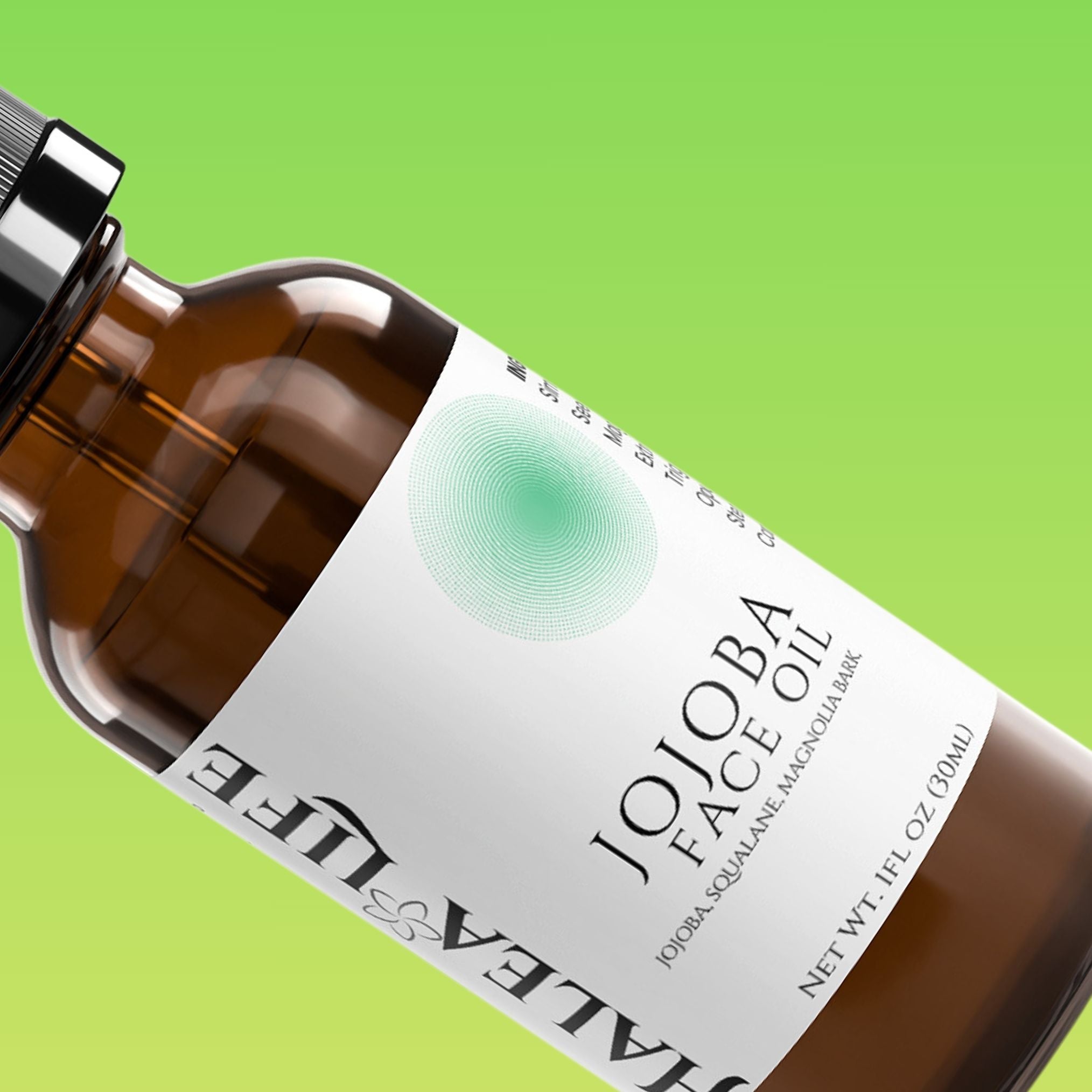 Bottle of Jojoba Face Oil on a green background