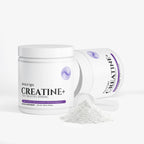 Creatine supplement container with scoop on a white background
